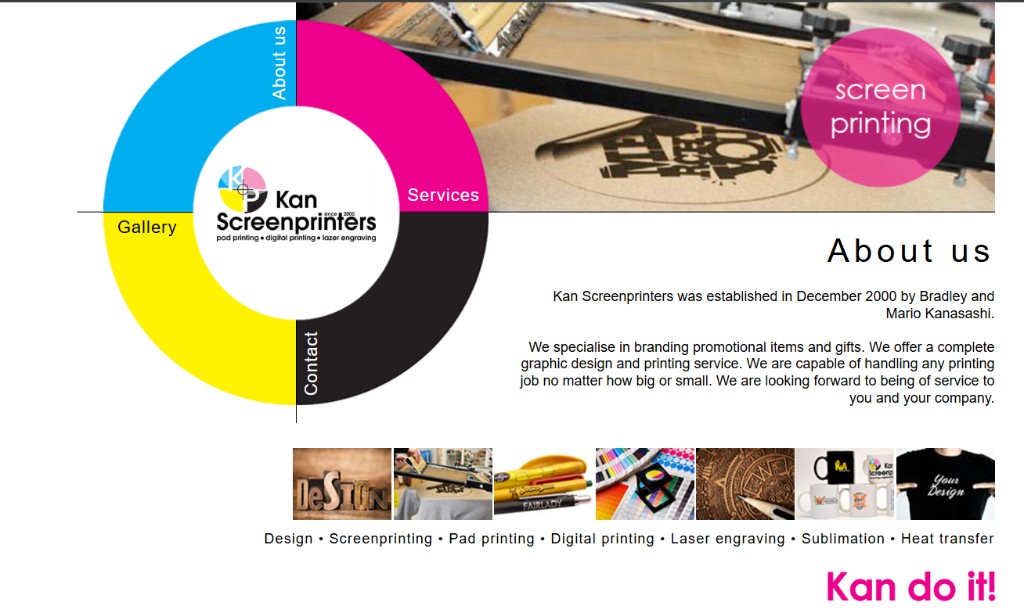 Screen printing press in the workshop with Kan Screenprinters branding